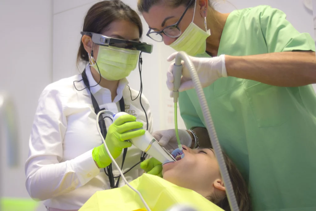 Emergency Dentists performing a surgery on a patient